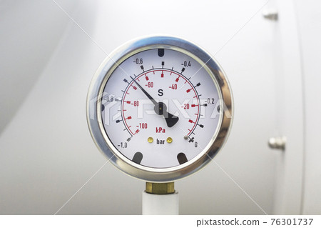 Vacuum pressure gauge meter details.Vacuum pressure gauge, part of vacuum chamber in laboratory. Vacuum pressure gauge meter details.Vacuum pressure gauge, part of vacuum chamber in laboratory. 76301737