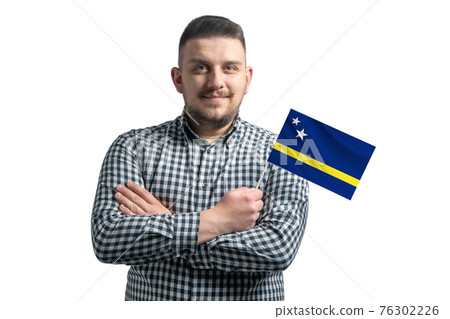 White guy holding a flag of Curacao smiling confident with crossed arms isolated on a white background White guy holding a flag of Curacao smiling confident with crossed arms isolated on a white background 76302226