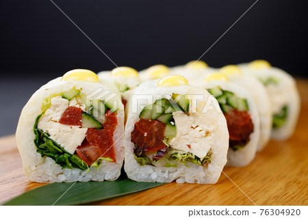 Sushi rolls with vegetables and tofu, vegan food Sushi rolls with vegetables and tofu, vegan food 76304920