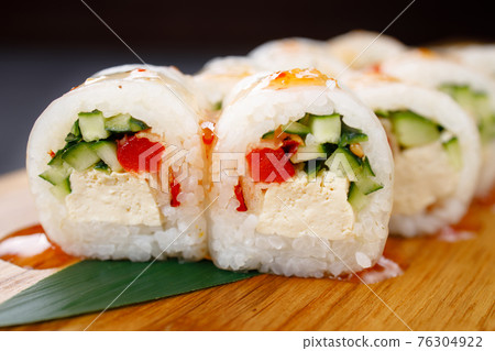 Sushi rolls with vegetables and tofu, vegan food 76304922