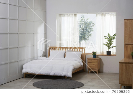 White bedroom with large window White bedroom with large window 76306295