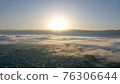 Sunrise in the fog 76306644