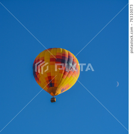 Peaceful flight over sunny Arizona in a brightly colored Hot Air Balloon. Maricopa County, Arizona 76310073