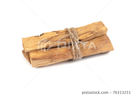 Palo Santo tree sticks isolated on white - holy incense tree from Latin America. Meditation, mental health and personal fulfilment concept. Selective focus 76313251