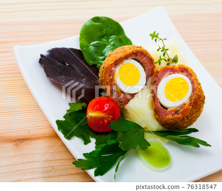 Scotch egg with quail eggs 76318547