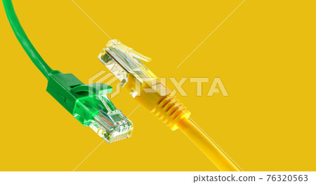 Ethernet cables with RJ45 plug on yellow background Ethernet cables with RJ45 plug on yellow background 76320563