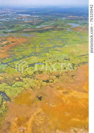 Aerial view, Okavango Delta, Okavango Wetland, Botswana Aerial view, Okavango Delta, Okavango Wetland, Botswana 76320942