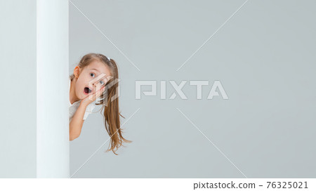 Pretty caucasian girl portrait isolated on white studio background with copyspace Pretty caucasian girl portrait isolated on white studio background with copyspace 76325021