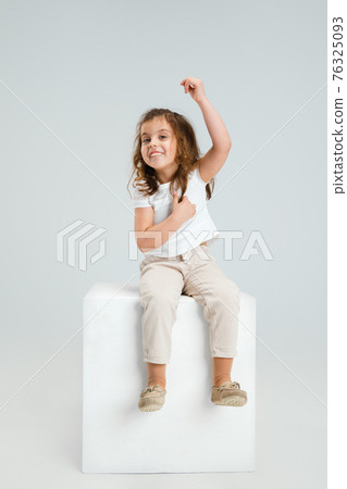 Pretty caucasian girl portrait isolated on white studio background with copyspace Pretty caucasian girl portrait isolated on white studio background with copyspace 76325093