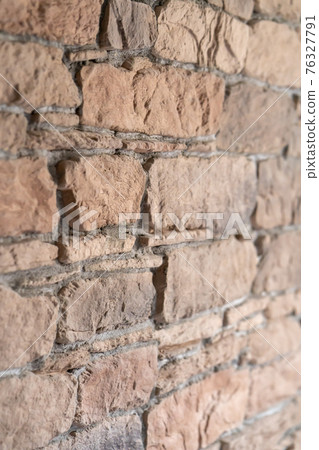 Brick wall made of old burnt bricks Brick wall made of old burnt bricks 76327791