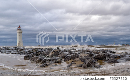 The lighthouse at New Brighton, Merseyside, UK, in stormy sea. The lighthouse at New Brighton, Merseyside, UK, in stormy sea. 76327810