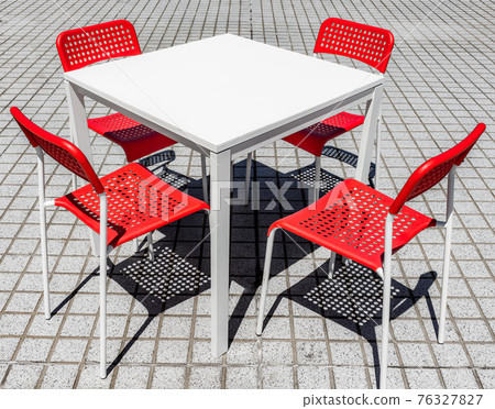 Red chairs and white table on patio, Uchinada, Kanazawa, Japan Red chairs and white table on patio, Uchinada, Kanazawa, Japan 76327827