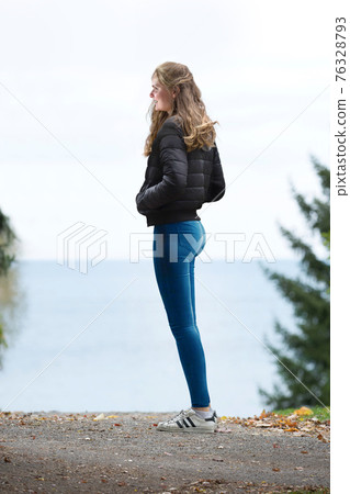 Lonely young woman 76328793