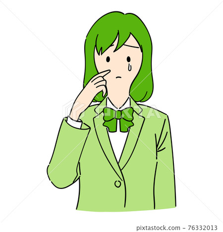 A female student who is sad and wipes her tears 76332013