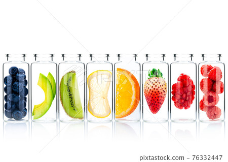 Homemade skin care with fruits ingredients avocado ,orange ,blueberry ,pomegranate ,strawberry and raspberry in glass bottles isolate on white background. Homemade skin care with fruits ingredients avocado ,orange ,blueberry ,pomegranate ,strawberry and raspberry in glass bottles isolate on white background. 76332447