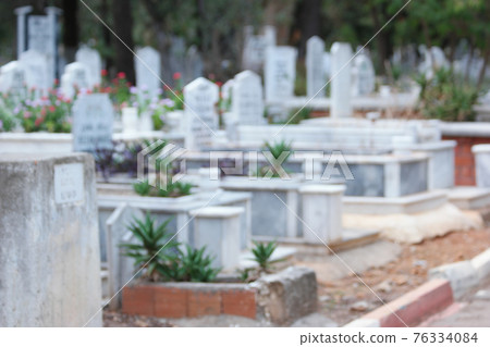 Headstones and graves at Muslim cemetery. Graves background. 76334084