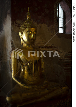 Ancient buddha statue at Wat Suthat temple ,Bangkok ,Thailand 76334959