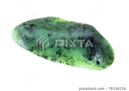 polished zoisite (saualpite) gem stone on white 76336216