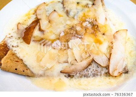 top view crepes with Gorgonzola and pear close up 76336367
