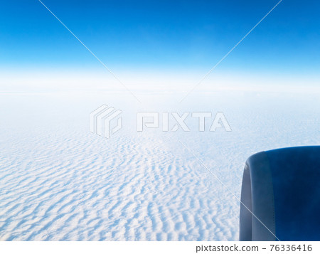 view of blue sky over dense cloudy surface view of blue sky over dense cloudy surface 76336416