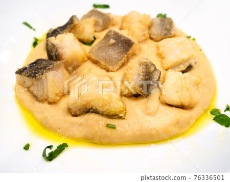 Italian cuisine - pieces of Baccala with hummus Italian cuisine - pieces of Baccala with hummus 76336501