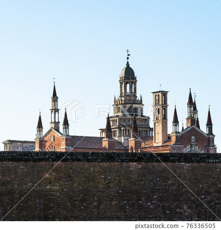 view of Certosa di Pavia with stone fence 76336505