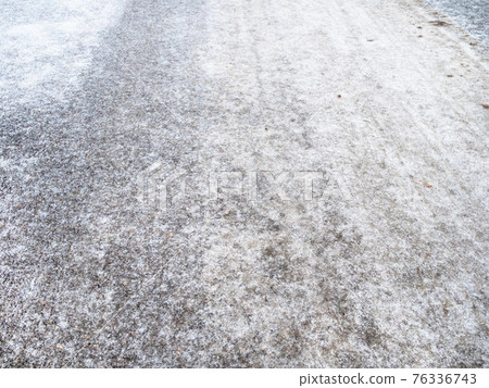 slippery frozen road after freezing rain slippery frozen road after freezing rain 76336743