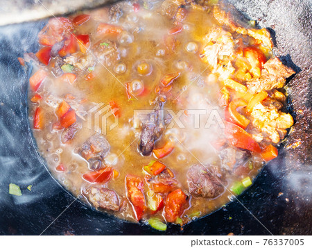 cooking the pottage from lamb and vegetables cooking the pottage from lamb and vegetables 76337005