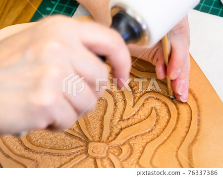 craftsman stamps decoration on leather surface craftsman stamps decoration on leather surface 76337386