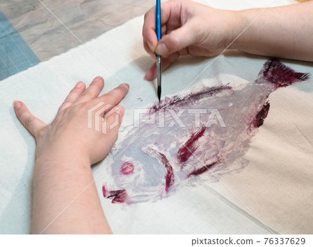 finishing fish print on fabric with painbrush 76337629