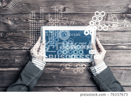 Business workplace with tablet device coffee cup and media user interface 76337673