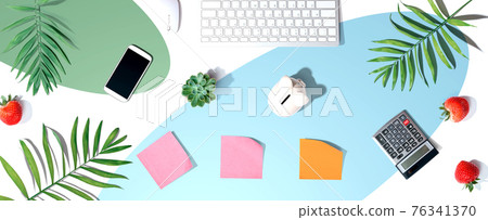 Computer keyboard with office supplies 76341370