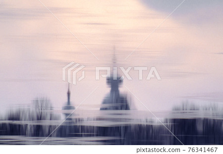 Smol'nyy Sobor Church reflection in frozen river Neva in winter. Retro film capture. Smol'nyy Sobor Church reflection in frozen river Neva in winter. Retro film capture. 76341467