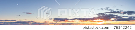 Panoramic View of Cloudscape during a colorful sunset Panoramic View of Cloudscape during a colorful sunset 76342242