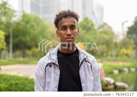 Portrait of handsome black African man with cool attitude 76343117