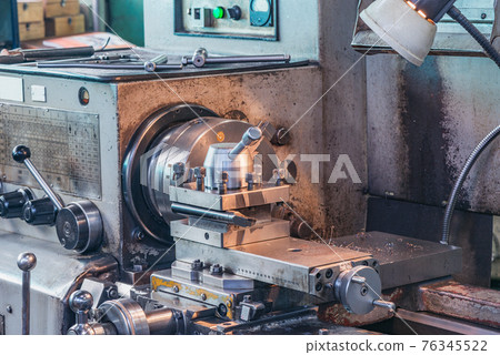 Machine part inside of the plant. 76345522