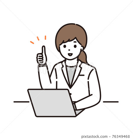 A female pharmacist giving a good sign in front of a computer 76349468