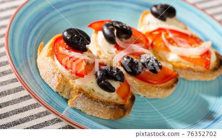 Hot sandwiches with cheese 76352702
