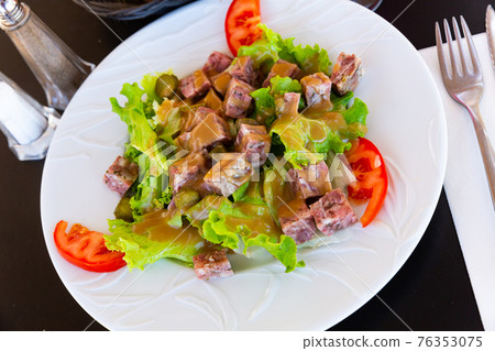 French salad with headcheese, pickles, greens, tomatoes French salad with headcheese, pickles, greens, tomatoes 76353075