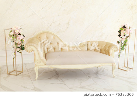 interior in the Baroque, Empire style. rooms in bright colors: small sofa, flowers 76353306