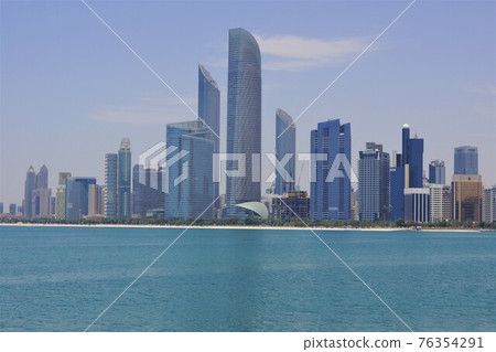 Buildings on Corniche Road seen from Abu Dhabi Breakwater Park 76354291