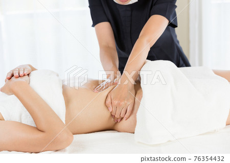Tummy oil massage Tummy oil massage 76354432