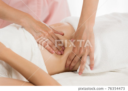 Tummy oil massage 76354473