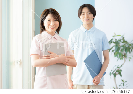 Men and women of long-term care staff 76356337