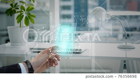 Digital interface with network of connections against person holding futuristic tablet at office 76356698