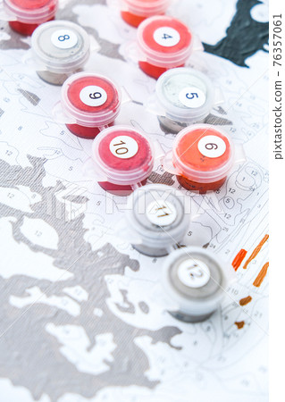 Acrylic paints on numbered canvas. Picture by numbers. Creative hobby. Painting for beginners. Hobbies for stay home isolation, anti-stress idea. Meditation, relax concept 76357061