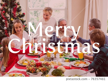 Merry christmas text over multi generation family having christmas dinner in background Merry christmas text over multi generation family having christmas dinner in background 76357481