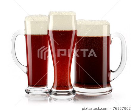 Set of fresh stout beer glasses with bubble froth isolated on white background. Set of fresh stout beer glasses with bubble froth isolated on white background. 76357902