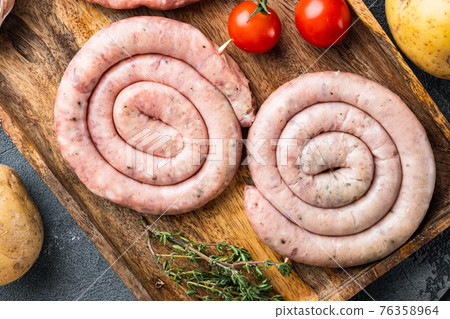 Raw meat sausage, on gray background, top view flat lay 76358964
