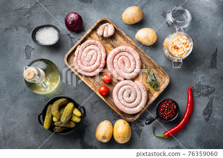 Bavarian sausage mashed potatoes and sour cabbage, on gray background, top view flat lay 76359060